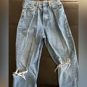 H+M light wash jeans with rips in knees. Great condition.